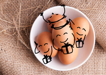 Happy eggs giving gifts for Christmas New year holiday concept.