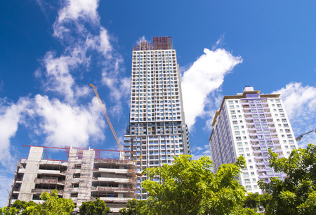 Crane is working on construction site backgroundの写真素材