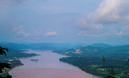 View of green filed and Khong river with blue sky background,agriculture from north east Thailand.の写真素材