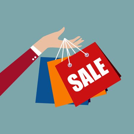 Woman hand holding shopping bags for mid year sale,flat design conceptの写真素材