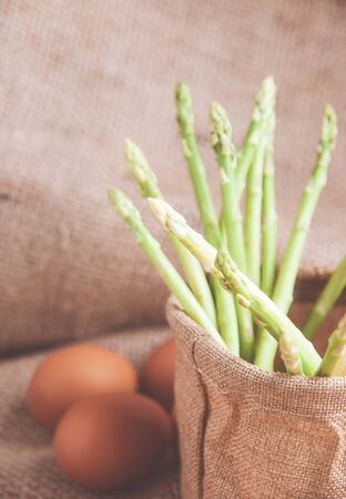 Fresh green asparagus on table for cookingの写真素材