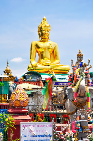 Beautiful Golden Buddha statue, at public temple, Wat Phabuddha navarantur - Golden Triangle in Chiang Rai,Thailand.の写真素材