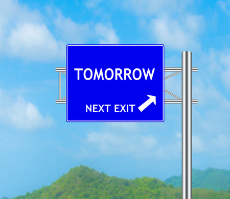 Road Sign concept to Tomorrow and Sky background.の写真素材