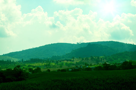 Abstract background of blue sky and white clouds with the sun shining