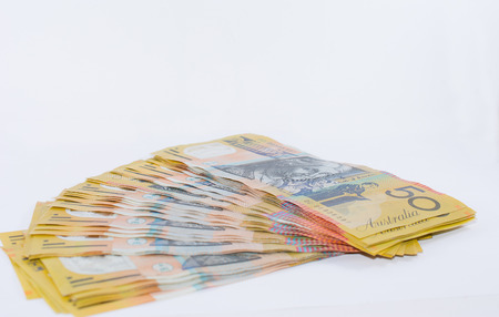 Pile of Australian Fifty Dollar Banknotes Isolated on Whiteの写真素材