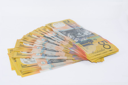 Pile of Australian Fifty Dollar Banknotes Isolated on Whiteの写真素材