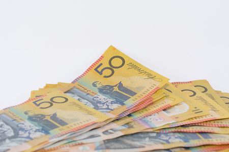 Pile of Australian Fifty Dollar Banknotes Isolated on Whiteの写真素材