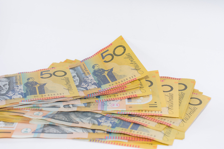 Pile of Australian Fifty Dollar Banknotes Isolated on Whiteの写真素材