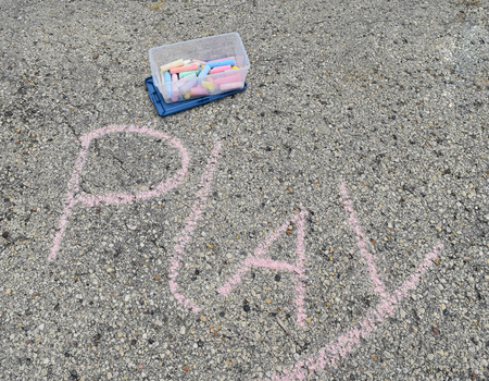 Side walk chalk and words on black topの写真素材