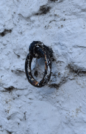 Detail of livestock ring in a barn wallの写真素材