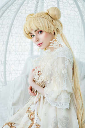 Beautiful white girl vintage renaissance dress indoors alone portraitの写真素材