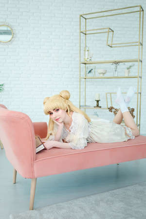 Beautiful white girl vintage renaissance dress indoors alone portraitの写真素材