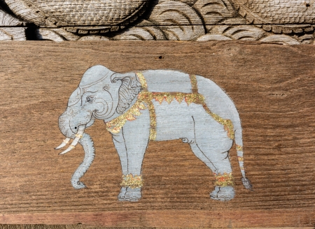 Paint of  elephants on wood in templeのeditorial素材