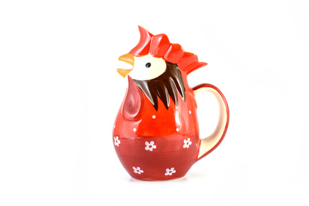 red chicken jug with white backgroundの写真素材