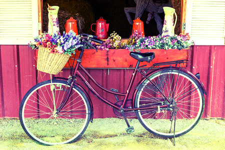 Old vintage bicycle with flower, Vintage styleの写真素材