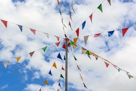 colorful flag with blue skyの写真素材