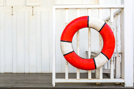 Lifebuoys on Wooden fenceの写真素材