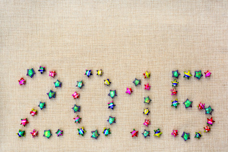 2015 arranged from star on sackcloth background