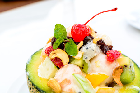 Fresh fruit salad served in melon bowlの写真素材