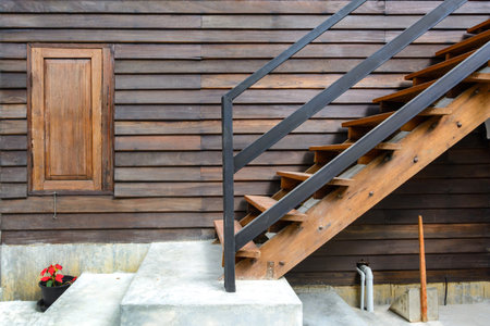 Wooden stairs with wooden window