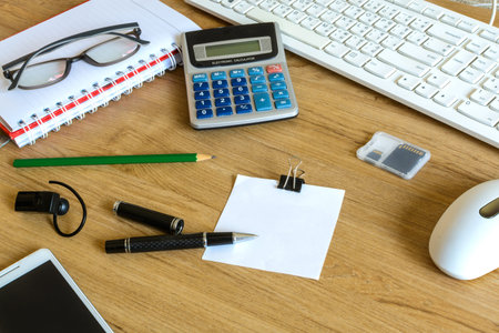 Computer keyboard and tools on desk, Workplace