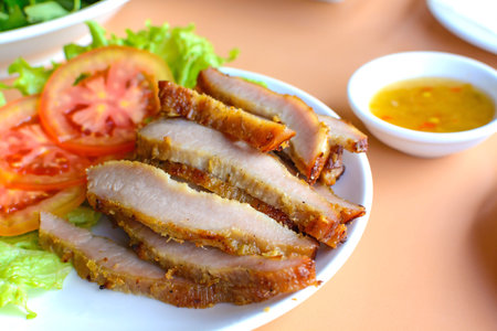 Close up of grilled pork with spicy sauceの写真素材