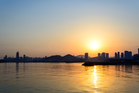 Silhouette of the city at twilight timeの写真素材