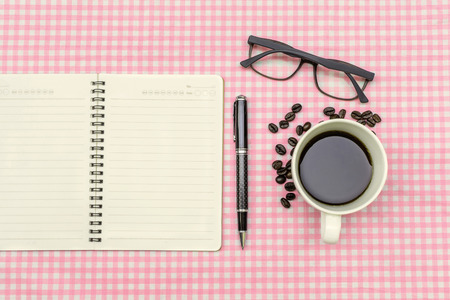 Blank note book with cup of coffee, Vintage styleの写真素材