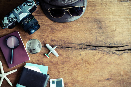 Outfit of traveler on wooden background, Vintage styleの写真素材