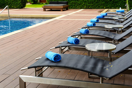 Towel on sun bed at poolside in the hotel