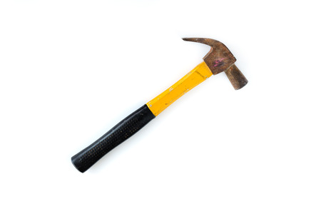 Old rusty hammer isolated on whiteの写真素材