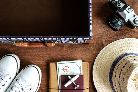 Outfit of traveler on wooden background, Vintage styleの写真素材