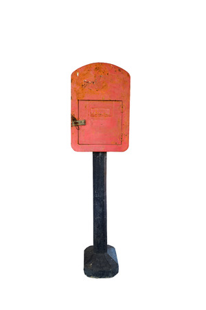Old rusty red metal mail box isolated on a white backgroundの写真素材