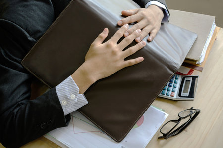 Exhausted and tired businessman sleeping in office