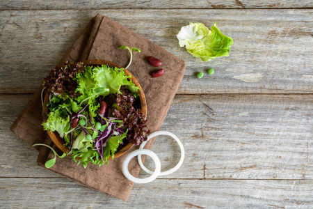 Close up of fresh hydroponic salad on wooden table, Top viewの写真素材