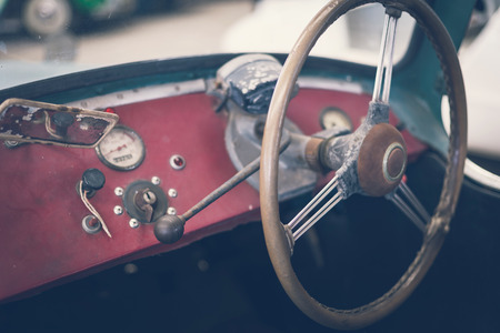 Close up on steering wheel, Classic car interior, Vintage toneの写真素材
