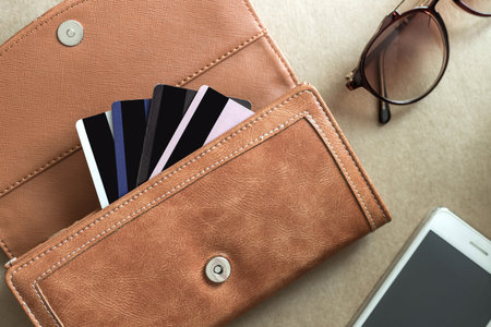 credit cards in the wallet with cellphone