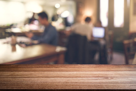 Empty wooden table space platform and blurred restaurant interior, Vintage tone