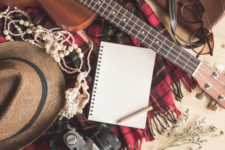 Blank notebook with ukulele and vacation stuff, Travel conceptの写真素材