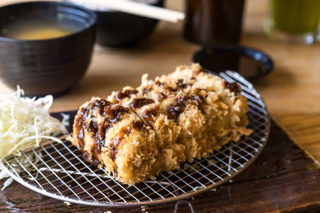 Tonkatsu, Deep-fried Pork served with slice cabbage, rice and miso soupの写真素材
