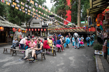 Xitou Taiwan - November 14, 2017: Many tourists walk around Xitou Monster Village the Japanese style village in Xitou, Taiwanのeditorial素材