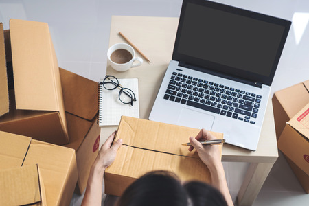 Young asian woman working online business at home, Online business owner conceptの写真素材