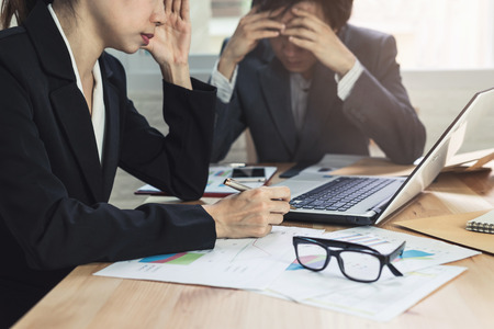 Coworkers team brainstorming and meeting to discuss and analysis the information together in office, Business conceptの写真素材