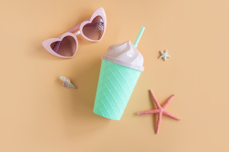 Women's accessories items and fancy glass on orange background, Summer vacation conceptの写真素材