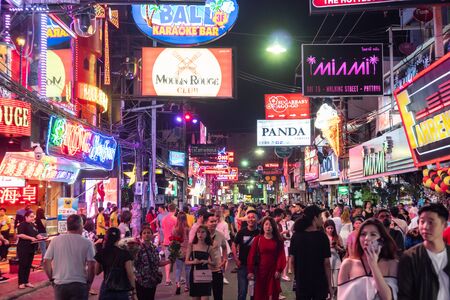 Pattaya, Thailand - March 06, 2019: Crowd of people enjoy night life at walking street in Pattaya, Thailand. Walking Street is an entertainment and red-light district in the city of Pattaya, Thailandのeditorial素材