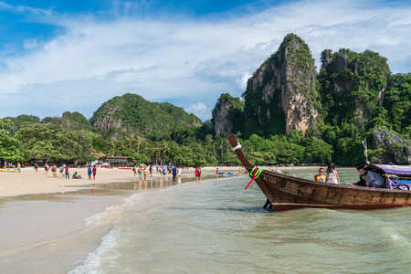 Krabi, Thailand -  July 15, 2019: Tourists enjoying a summer vacation at tropical sand beach in Krabi, Thailandのeditorial素材
