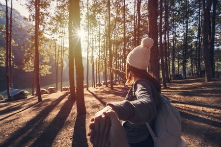 Young couple traveler camping in nature on vacation at Pang Ung, Mae Hong Son, Thailandの写真素材
