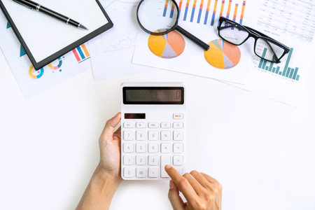 Businessman working on Desk office business financial accounting calculate, Graph analysisの写真素材