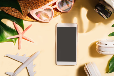 Travel summer accessories and empty screen smart phone on color background with copy space, Vacation...