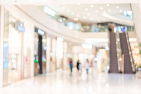 Abstract Blurred image of people walking in shopping mallの写真素材